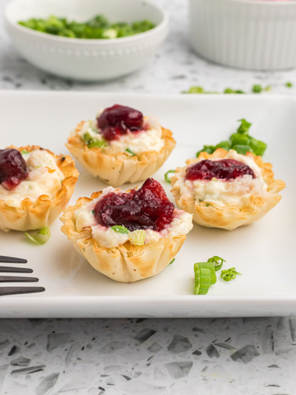 cranberry crab phyllo cups on a platter