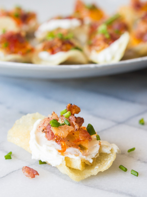 potato chips topped with goat cheese pepper jelly and bacon