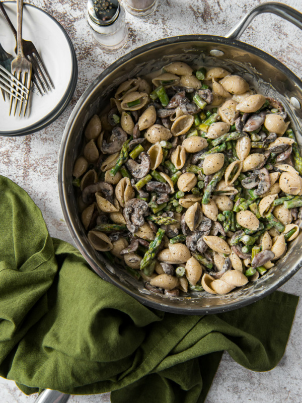 pasta shells with mushrooms and boursin in pan