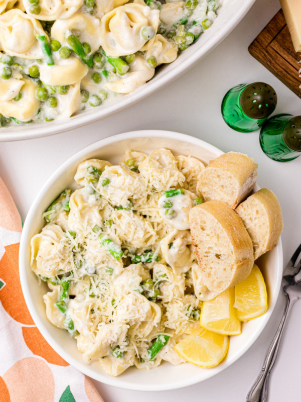 Tortellini, Peas and Asparagus with Creamy Tarragon Sauce in a bowl