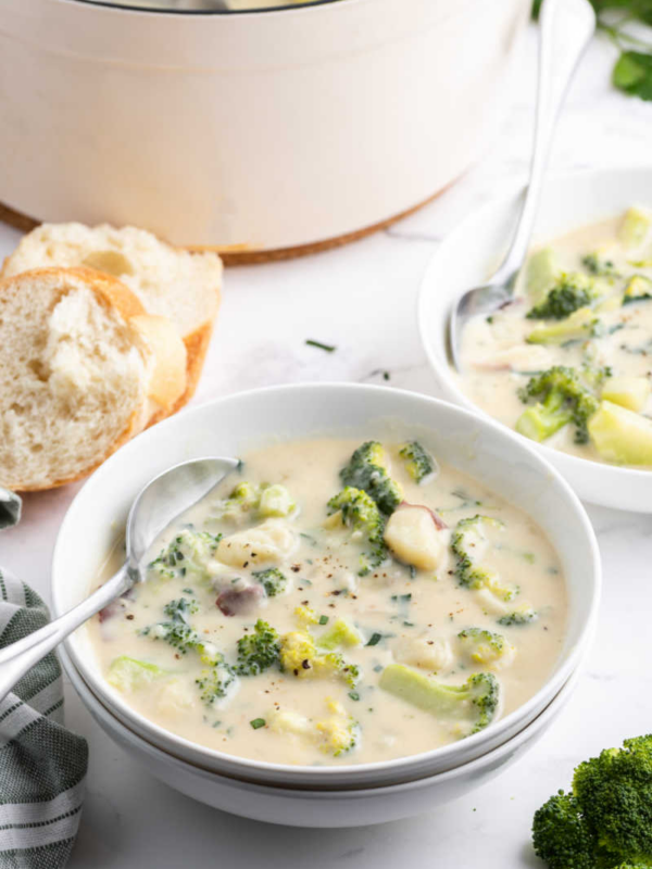 spoon in a bowl of broccoli potato soup