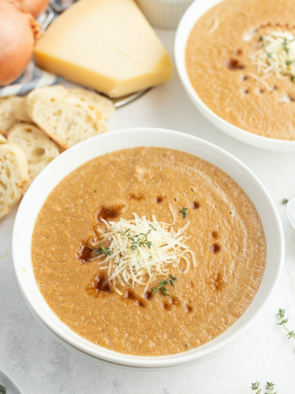 caramelized onion soup in a white bowl