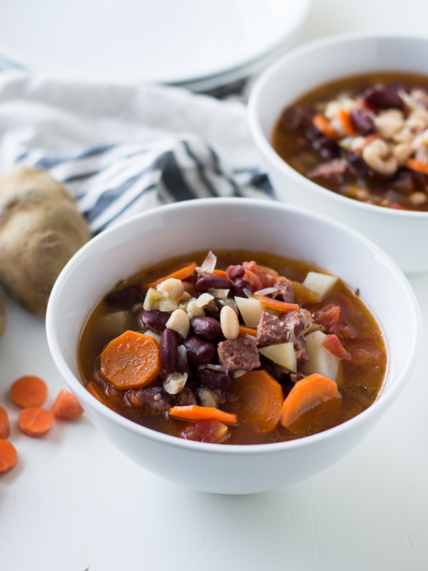 bean and chorizo soup in a bowl