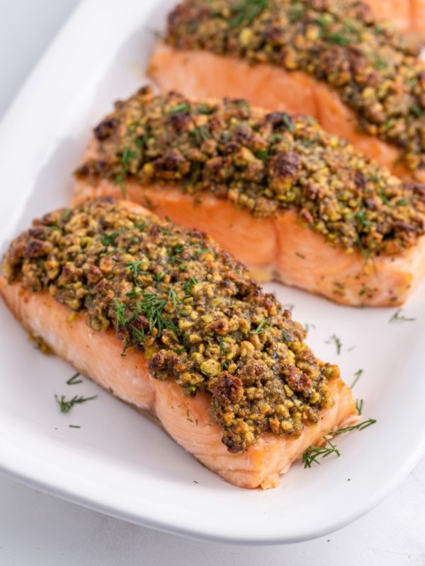 pistachio baked salmon filets on platter