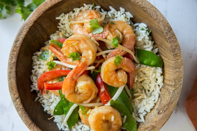 https://www.recipegirl.com/wp-content/uploads/2006/10/coconut-curry-stir-fried-shrimp-HORIZ.jpg