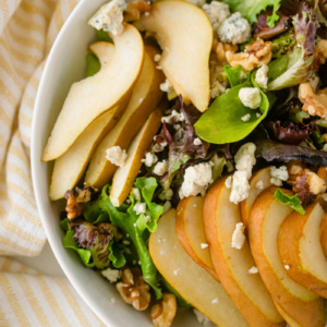 pear walnut and blue cheese salad in bowl