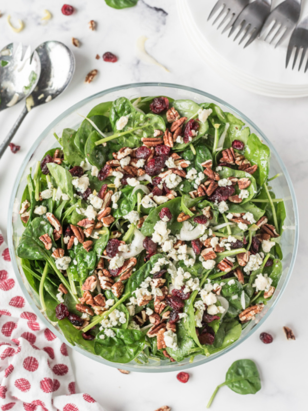 Spinach and Endive Salad with Blue Cheese and Pecans in a bowl