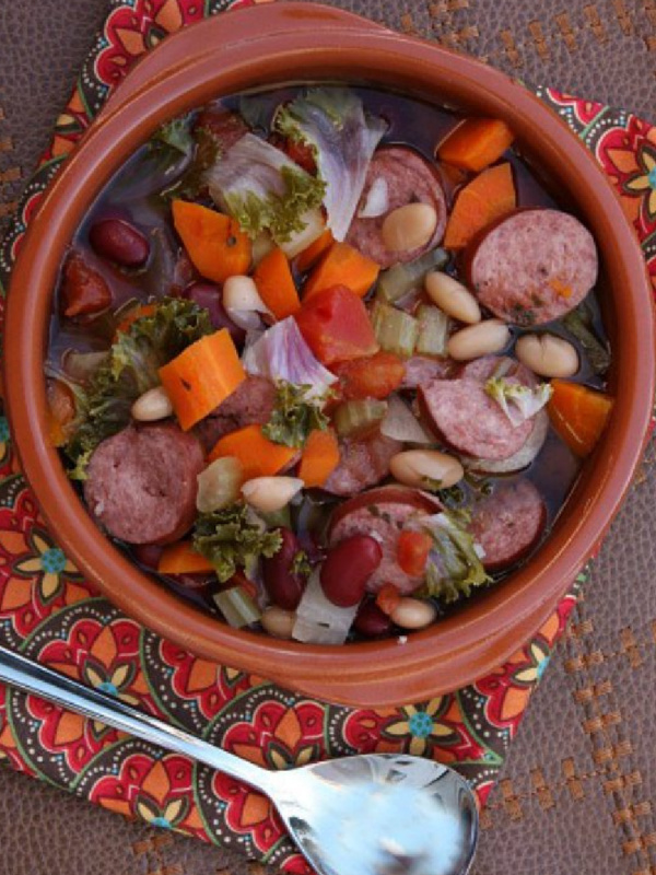 bowl of slow cooker tuscan sausage and bean soup