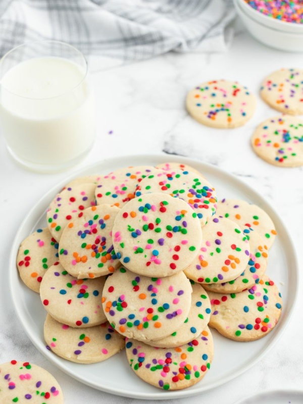 celebration cookies on a white plate