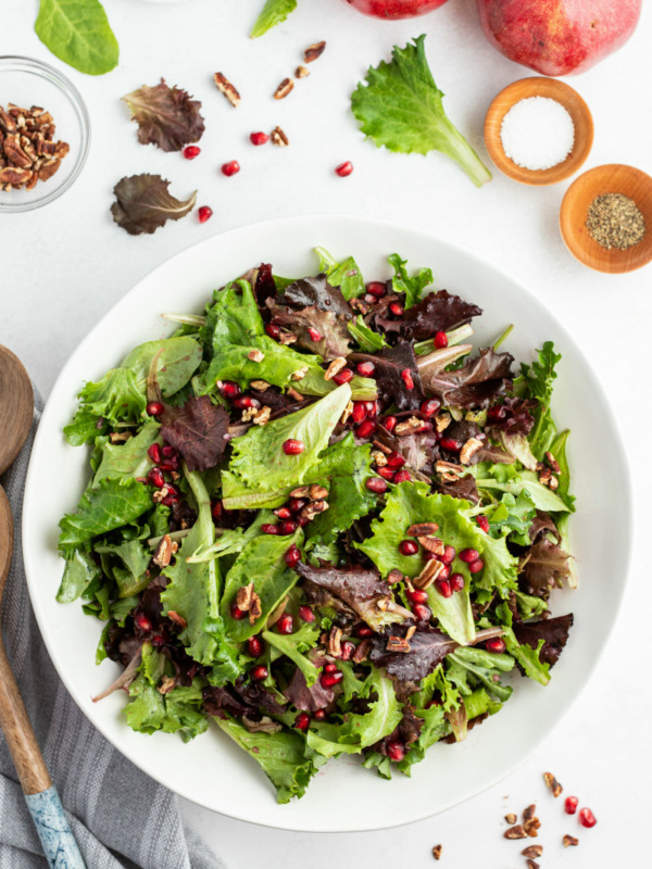 serving of mixed greens pomegranate salad