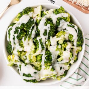 pinterest image for broccoli with two cheese sauce