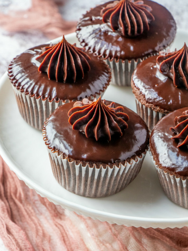 platter of chocolate ganache cupcakes