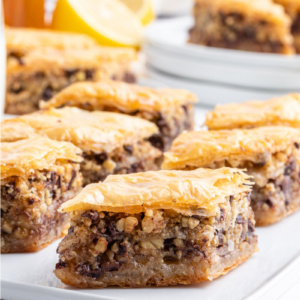 chocolate baklava on a white platter