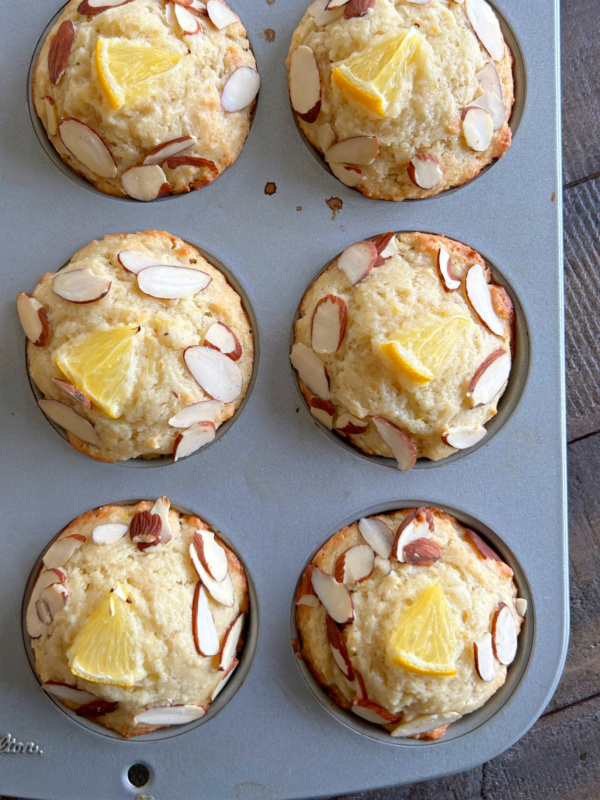 meyer lemon ricotta muffins in muffin pan