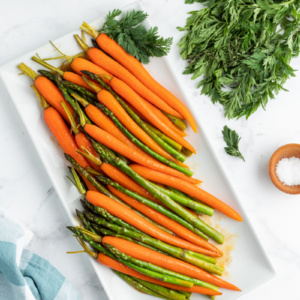 asparagus and carrots on serving platter