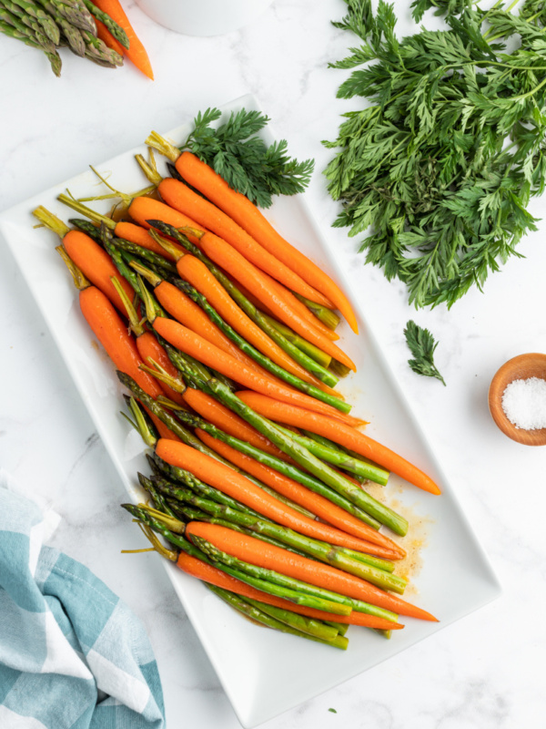 asparagus and carrots on serving platter