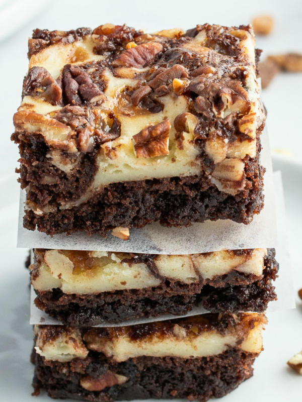 stack of three cream cheese swirl brownies