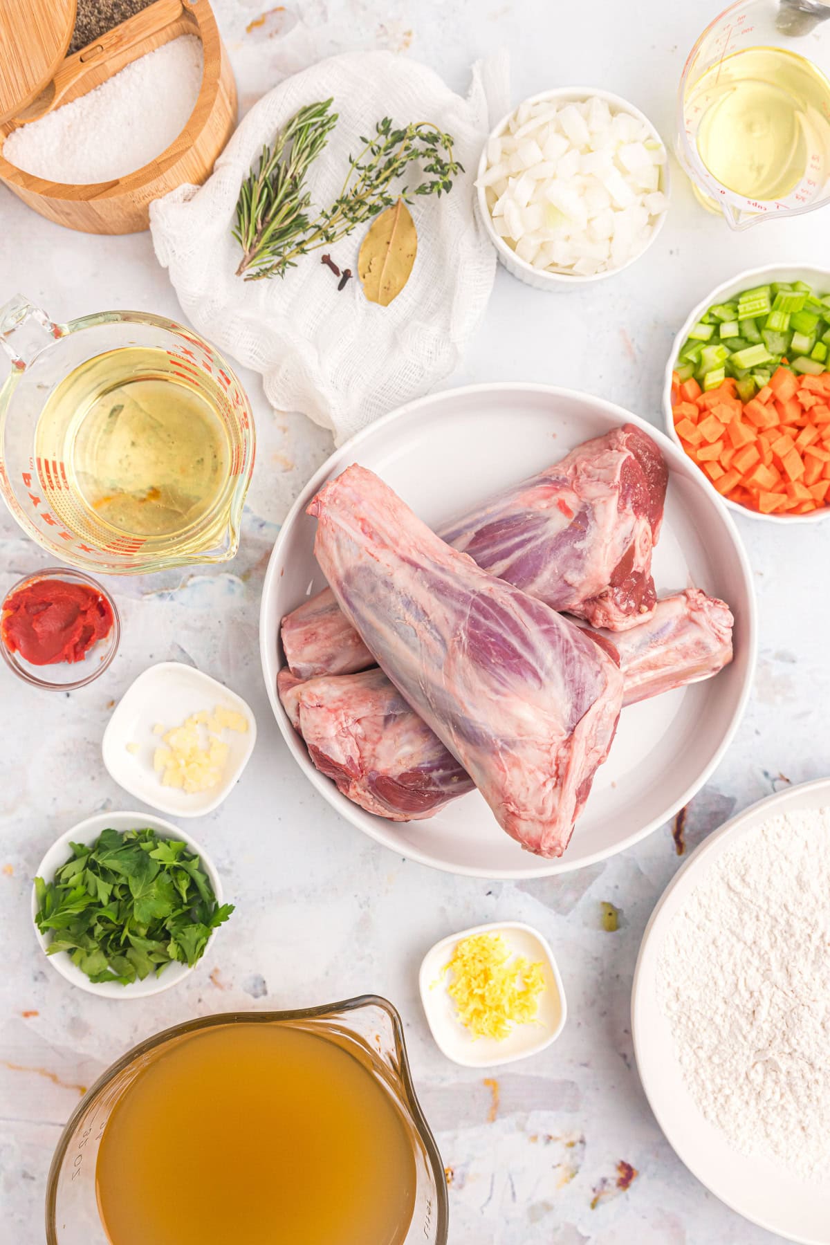 ingredients displayed for making lamb osso buco