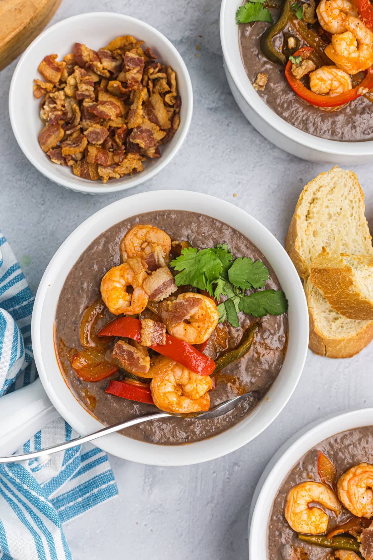 bowls of black bean bisque with shrimp