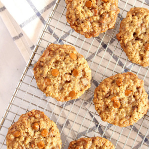 loaded oatmeal cookies on a cooling rack