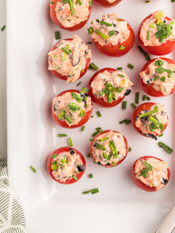 salmon stuffed cherry tomatoes on platter