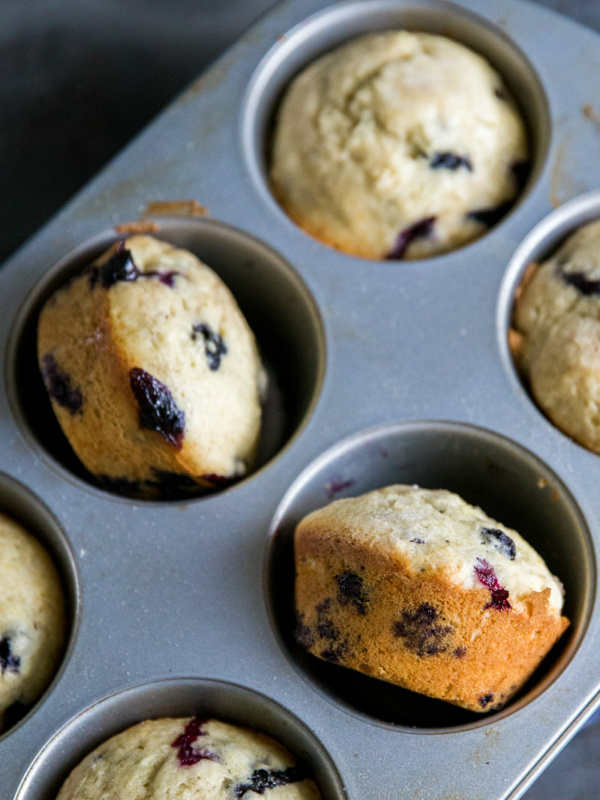 overhead shot of lemon blueberry muffins in a muffin pan