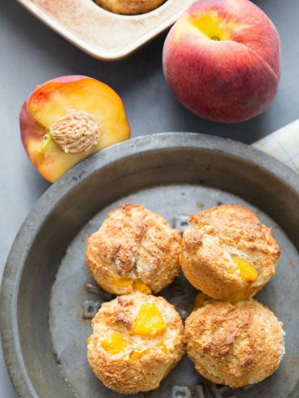 peach and brown sugar muffins in a pan