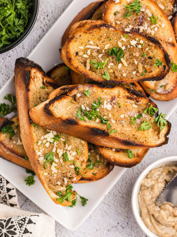 peppery grilled garlic bread on a plate