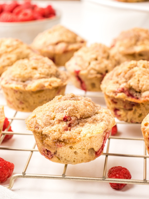 raspberry muffins on cooling rack