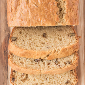 loaf of sour cream maple bread cut on cutting board