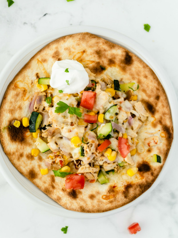 chicken and summer vegetable tostada overhead shot