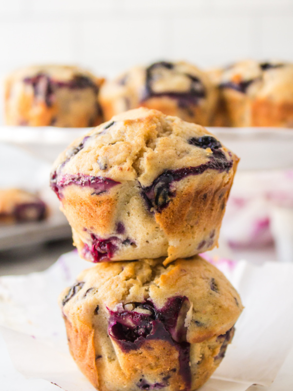 two blueberriest muffins stacked