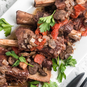 braised short ribs on a white platter