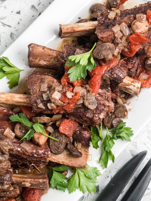 braised short ribs on a white platter