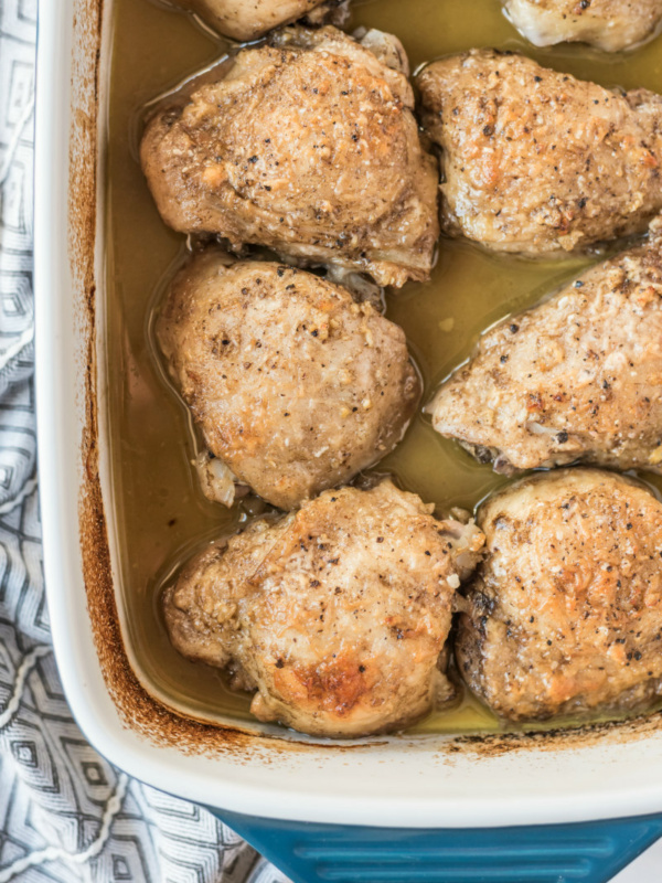 lemon parmesan chicken in white casserole dish