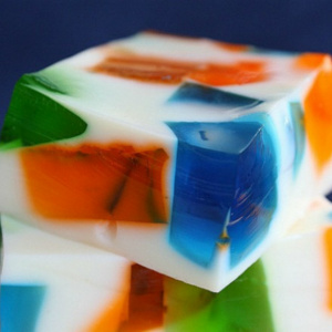 stacked pieces of sea glass jello with a blue background