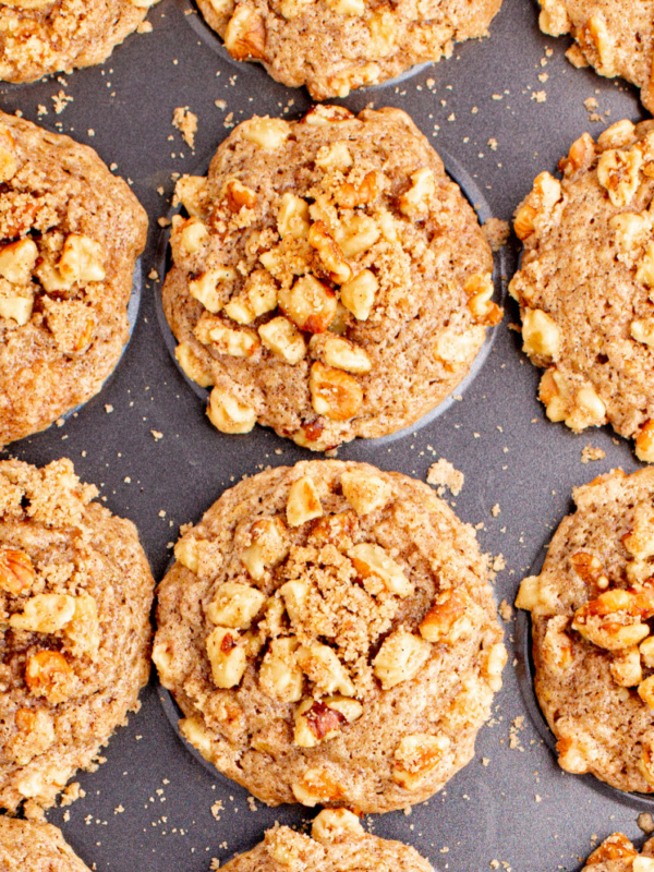 sweet peach muffins in a baking pan