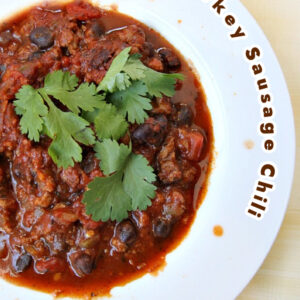 pinterest image for black bean turkey sausage chili