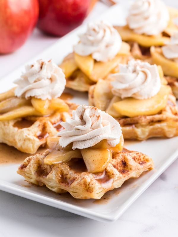 caramelized apple waffle pastries on white plate