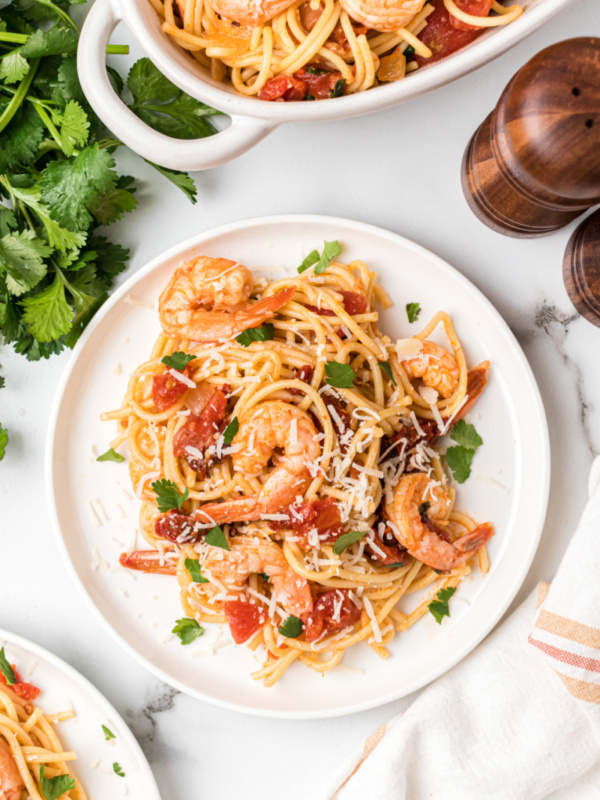 serving on plate of chipotle beer shrimp pasta