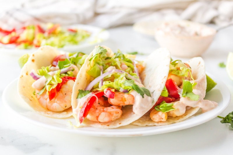 tequila lime shrimp tacos on a plate