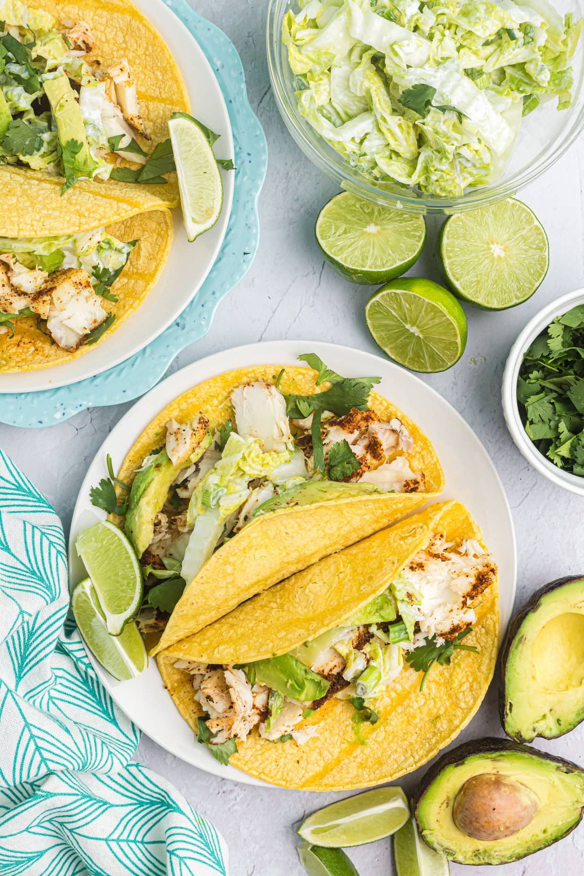 overhead shot of cedar planked halibut tacos on plates