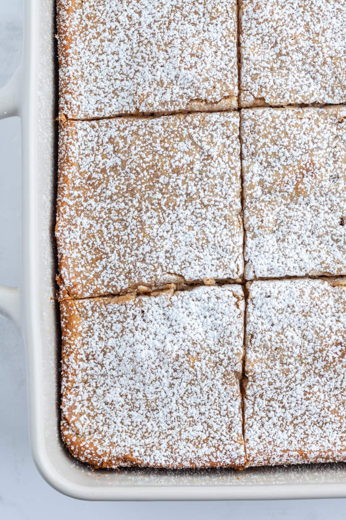 ginger spice cake in pan cut into pieces