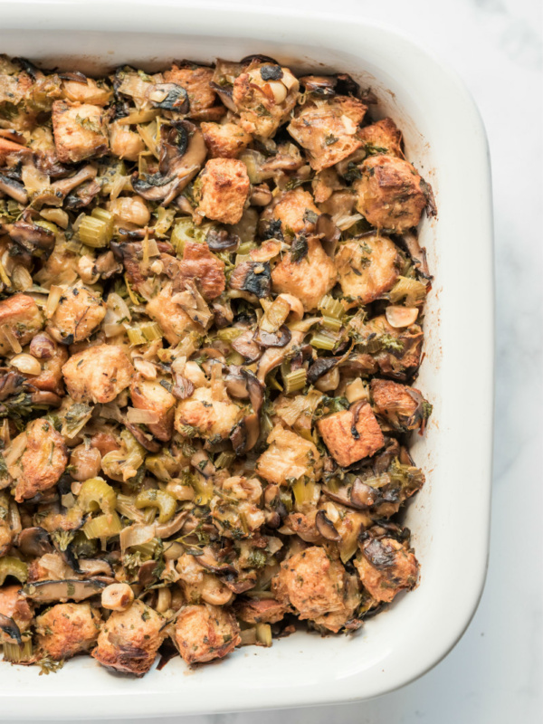 wild mushroom stuffing in a white casserole dish