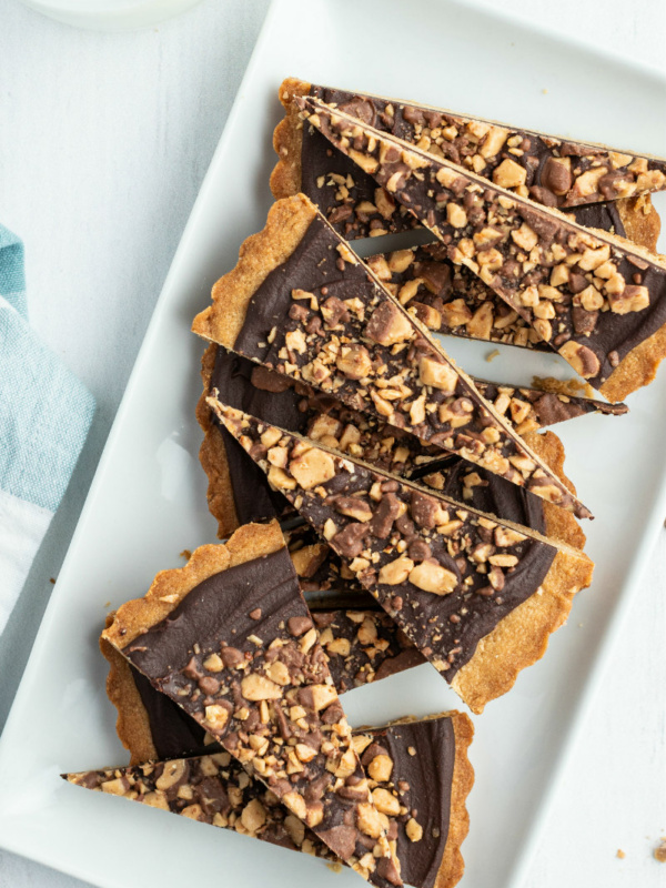 chocolate toffee wedges on a white platter