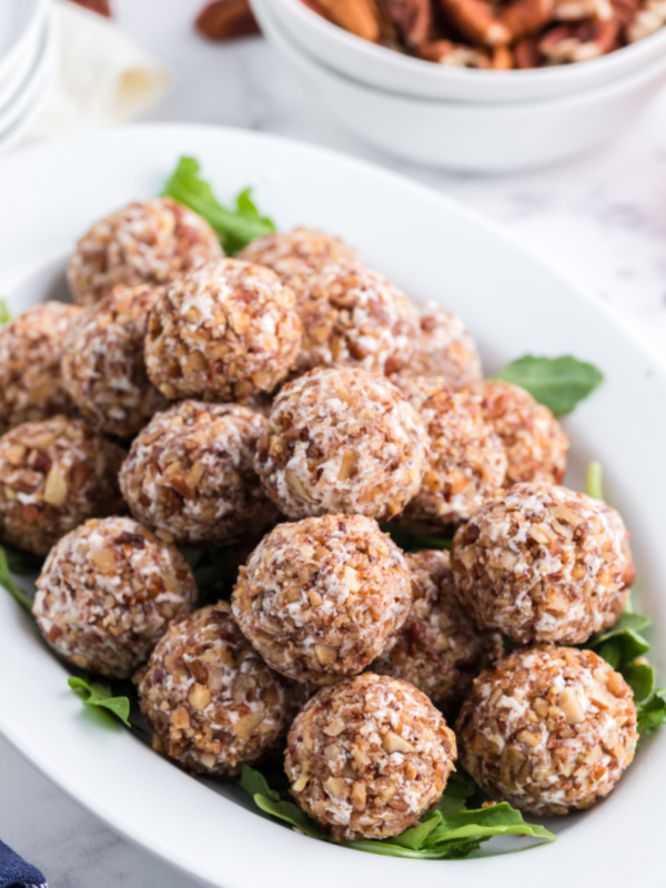 goat cheese truffles stacked on a platter