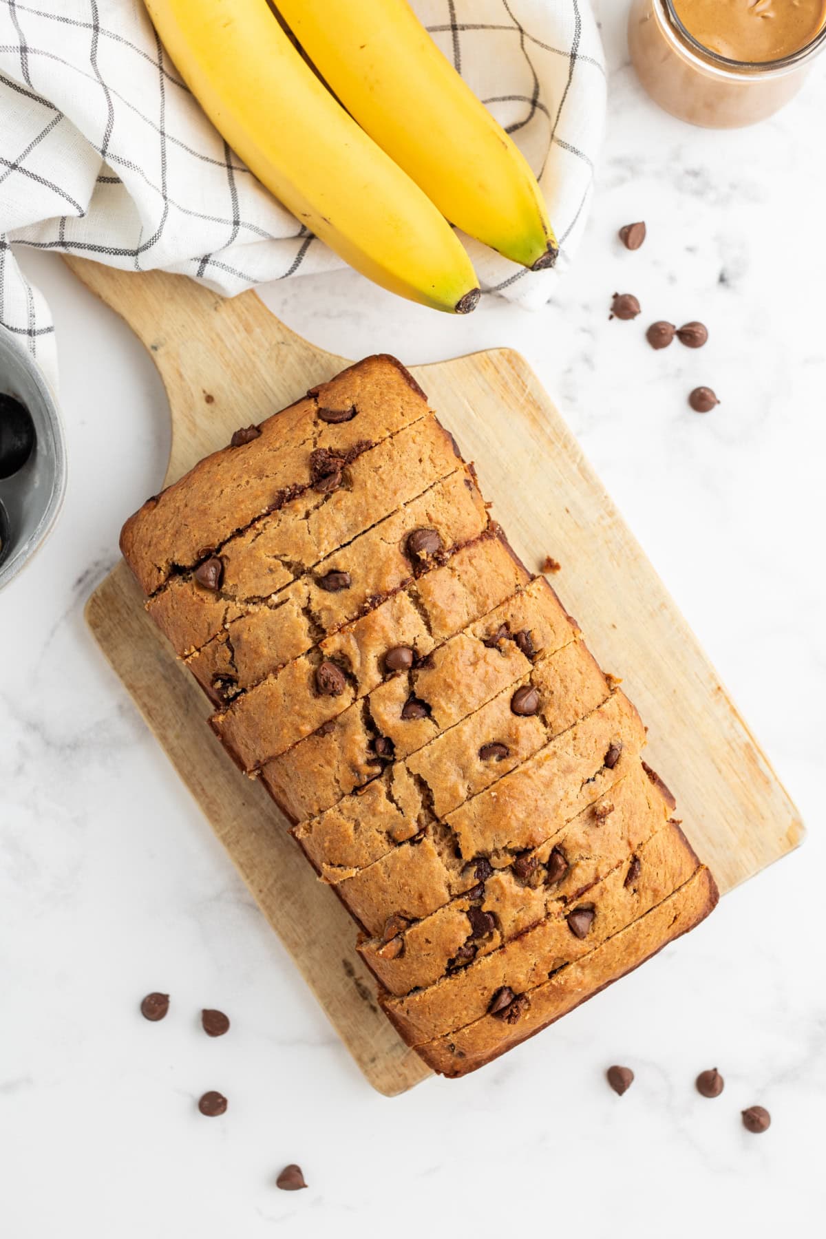 overhead shot of peanut butter chocolate chip banana bread sliced