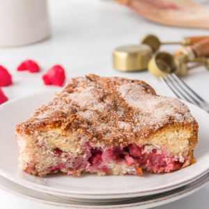 slice of raspberry coffee cake on white plate