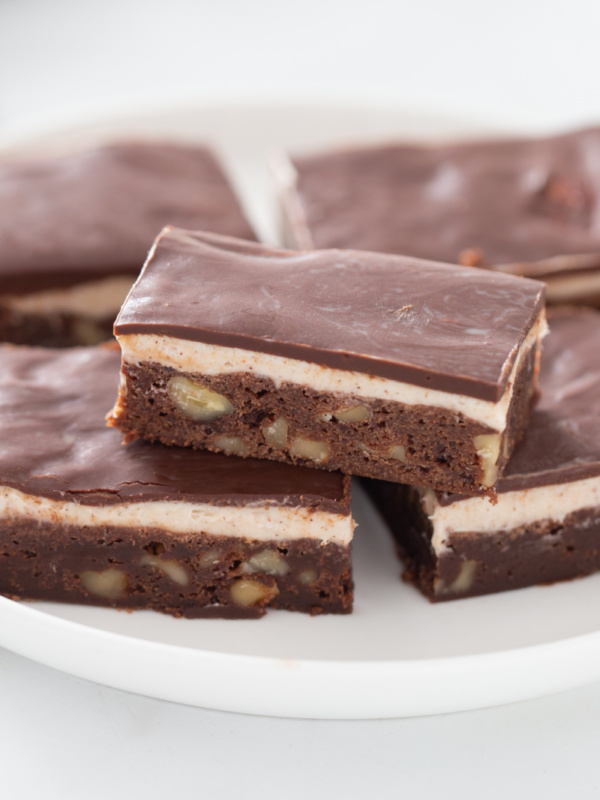 cappuccino brownies displayed on white plate