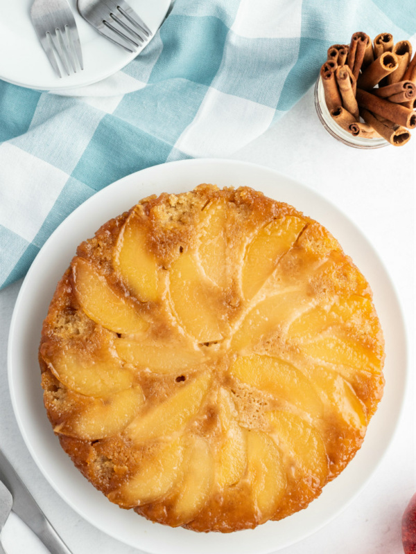 apple cinnamon upside down cake on white plate